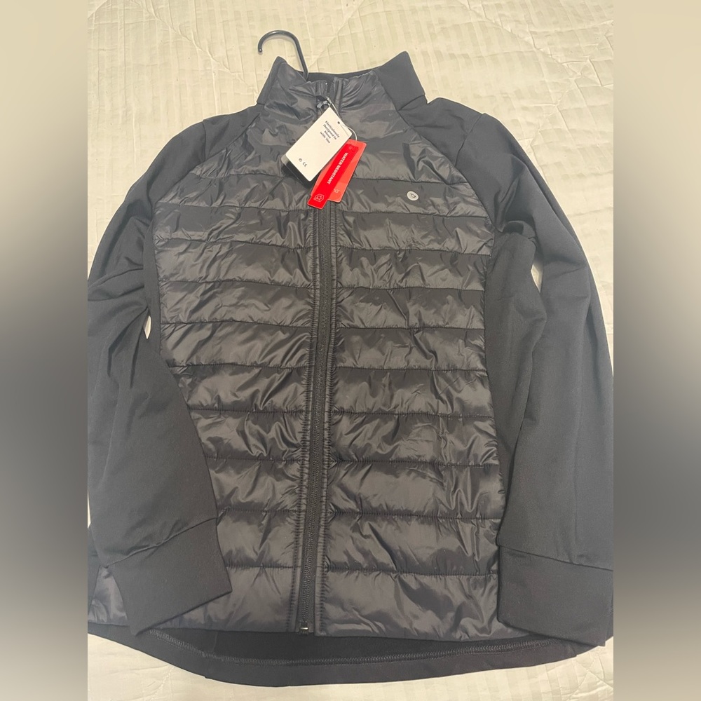 New with tags, black, activewear jacket, pockets. Size small. Water resistant.